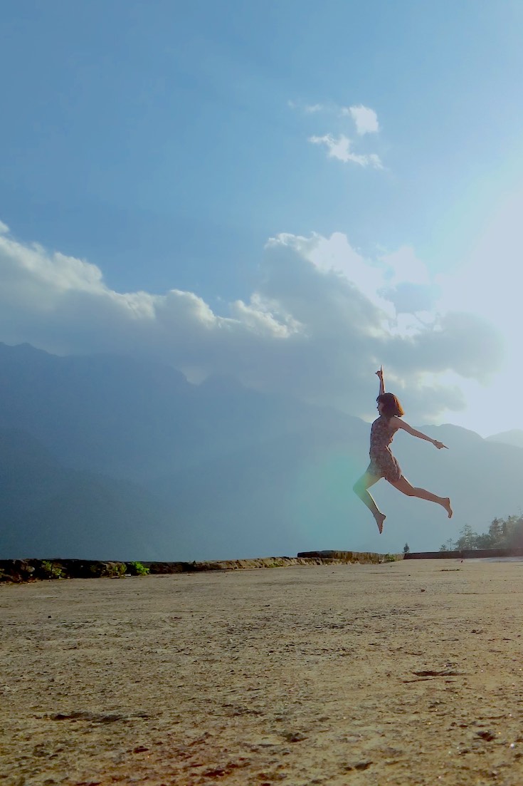 Woman jumping in the air