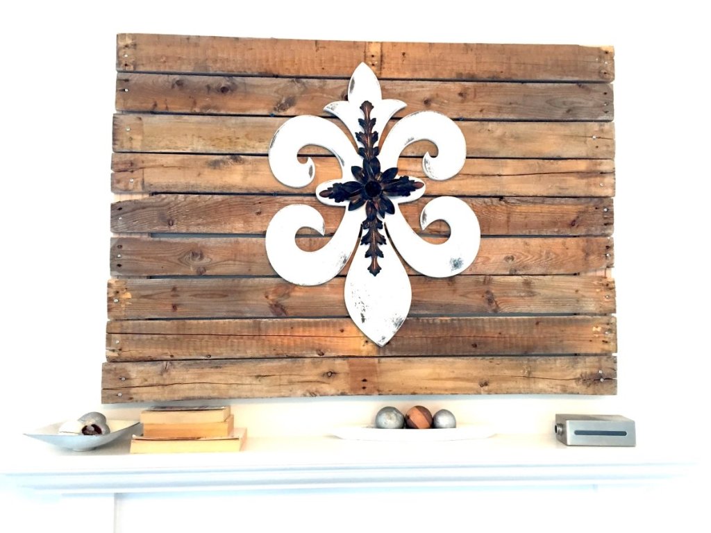 DIY pallet wall art above mantle