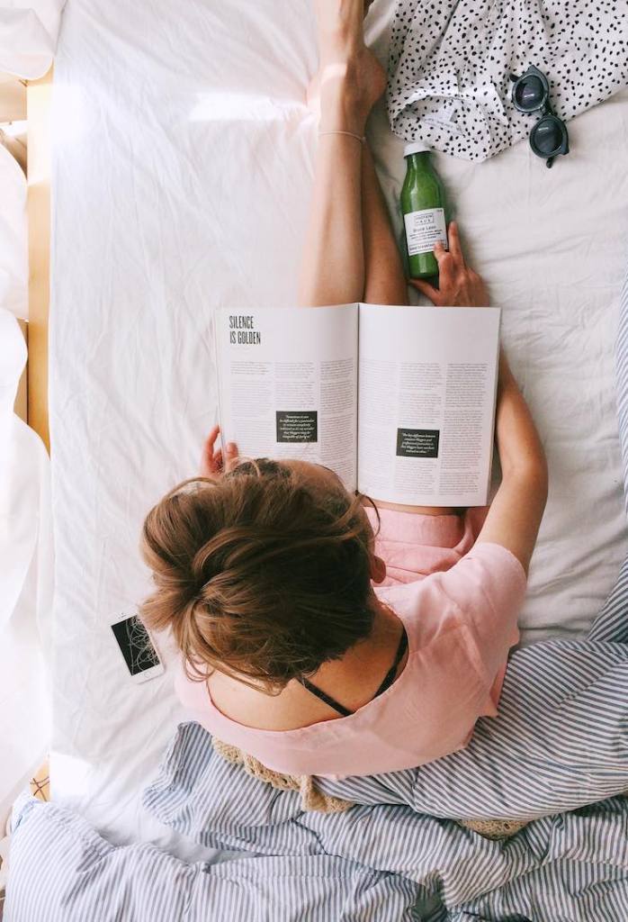 Woman reading on the bed