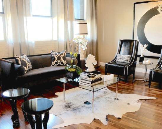 Contemporary living room with cowhide rugs