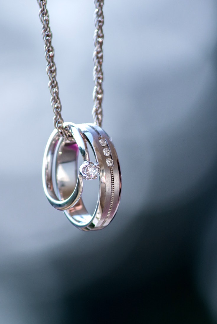 Platinum wedding bands in a necklace