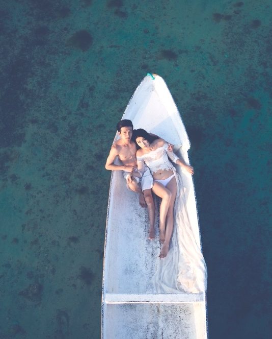 Couple poses for engagement photo shoot